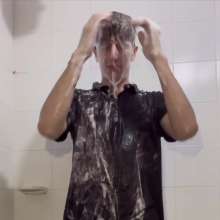WETColours: Shower in Red Polo Shirt and Black Pants with Mega Shampoo