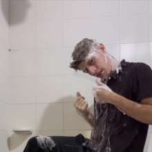 WETColours: Shower in Red Polo Shirt and Black Pants with Mega Shampoo
