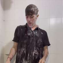 WETColours: Shower in Red Polo Shirt and Black Pants with Mega Shampoo