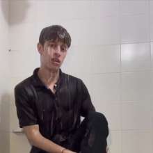 WETColours: Shower in Red Polo Shirt and Black Pants with Mega Shampoo