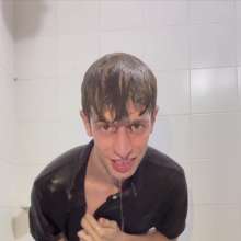 WETColours: Shower in Red Polo Shirt and Black Pants with Mega Shampoo