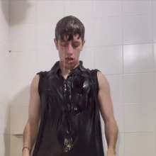 WETColours: Shower in Red Polo Shirt and Black Pants with Mega Shampoo