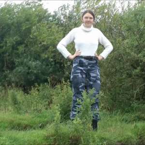 DungeonMasterOne: Mud: Chastity wears combats, heeled boots, white jumper, into the mudbanks!