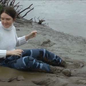 DungeonMasterOne: Mud: Chastity wears combats, heeled boots, white jumper, into the mudbanks!