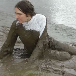 DungeonMasterOne: Mud: Chastity wears combats, heeled boots, white jumper, into the mudbanks!