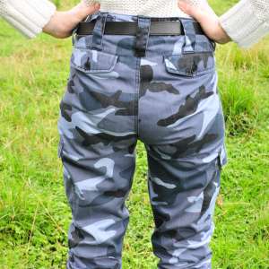 DungeonMasterOne: Mud: Chastity wears combats, heeled boots, white jumper, into the mudbanks!