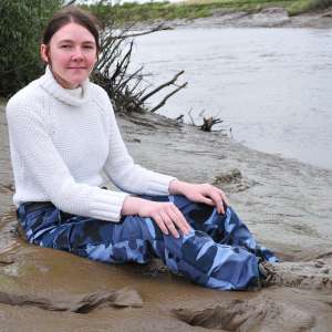 DungeonMasterOne: Mud: Chastity wears combats, heeled boots, white jumper, into the mudbanks!