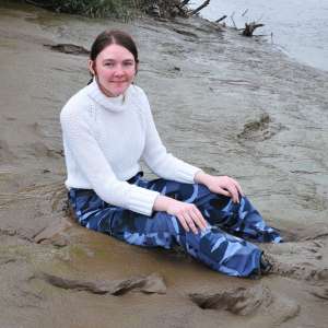 DungeonMasterOne: Mud: Chastity wears combats, heeled boots, white jumper, into the mudbanks!