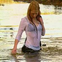 katew: Tammy in business suit in the river