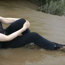DungeonMasterOne: Chastity wears designer Armani jeans into the mudbanks!