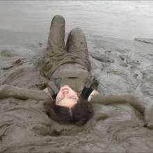 DungeonMasterOne: Chastity wears designer Armani jeans into the mudbanks!