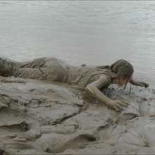 DungeonMasterOne: Chastity wears designer Armani jeans into the mudbanks!