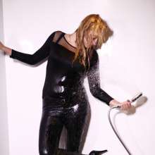 eileenvogel: Eileen in leather leggings posing in a hotel room