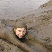 DungeonMasterOne: Download: Blonde Felicity takes to the mudbanks in a Spandex catsuit!