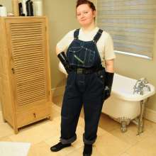 DungeonMasterOne: Cynthia wears her denim overalls in the bath and shower