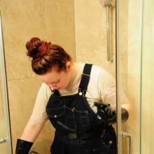 DungeonMasterOne: Cynthia wears her denim overalls in the bath and shower