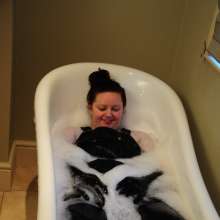 DungeonMasterOne: Cynthia wears her denim overalls in the bath and shower