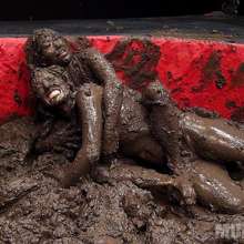 wamfan: Kym Jane and Nicole Oring in the mud