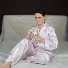 MessyCleo: Cleo drenches her pink satin pyjamas in baby oil