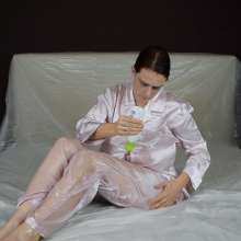 MessyCleo: Cleo drenches her pink satin pyjamas in baby oil