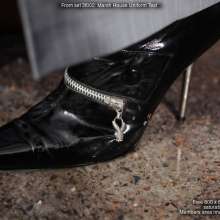 DungeonMasterOne: Maude gets soggy in a sharp business suit and Playboy boots!