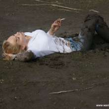 eileenvogel: Eileen getting muddy in white shirt and jeans