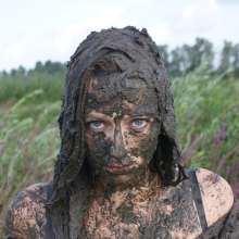eileenvogel: Eileen getting muddy in white shirt and jeans