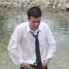 wamgame1: Chris Soaked in a Suit in the River