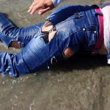 Wet_look_elena: Ripped Jeans and Stockings in the Sea