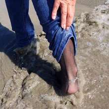 Wet_look_elena: Ripped Jeans and Stockings in the Sea