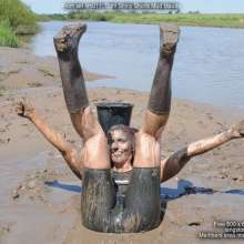 DungeonMasterOne: Very muddy Maude in tight and shiny shorts and top!