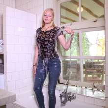WetPlace: Beautiful Eileen Taking Shower In jeans And Floral Shirt At Home