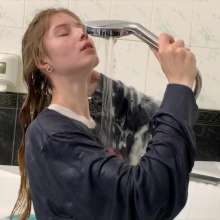 Wet Live Team: Nastya Lathers Her Breasts and Takes a Bath Fully-clothed