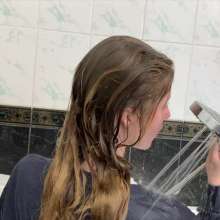 Wet Live Team: Nastya Lathers Her Breasts and Takes a Bath Fully-clothed