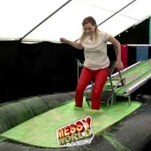 LiquidX: Cat Plunged in Ankle Socks, Red Trousers and White Top