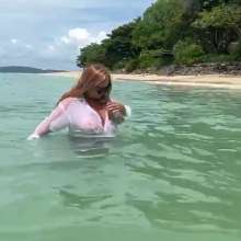 Wet_look_elena: Very Thin White Top and Skintight Jeans in the Sea
