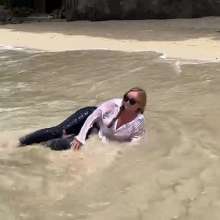 Wet_look_elena: Very Thin White Top and Skintight Jeans in the Sea