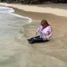 Wet_look_elena: Very Thin White Top and Skintight Jeans in the Sea