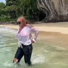 Wet_look_elena: Very Thin White Top and Skintight Jeans in the Sea
