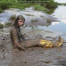 DungeonMasterOne: Maude in the mud in a cherry-print mini-dress and go-go boots!