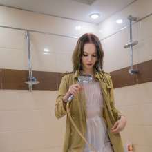 Wet Live Team: Mila in a Transparent Dress and Coat Is All Wet