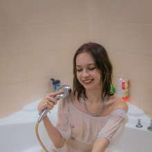 Wet Live Team: Mila in a Transparent Dress and Coat Is All Wet
