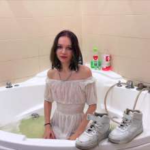 Wet Live Team: Mila in a Transparent Dress and Coat Is All Wet