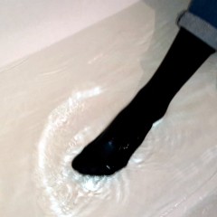 wetlookgirlsvideo.com: Angela in wet jeans, shoes and Nylon stockings