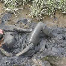 LisaMoomin: Nadia wears a great black and green skater dress in the mud.