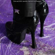 DungeonMasterOne: Veronica: swimsuit filling, pleather dungarees, and six inch heels!