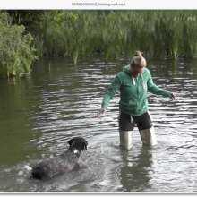 bootedbabes: Nicky walks her dog wearing waders