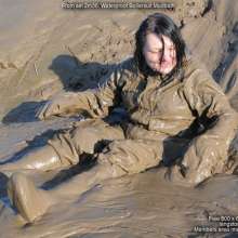 DungeonMasterOne: Mud glorious mud!  Evelyne the cook takes a mudbath in a hazmat boilersuit!