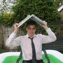 wamgame1: Chris on Laptop Soaked in Garden Pool