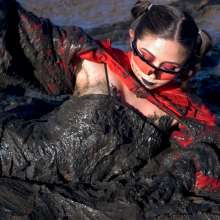 EgyptianRRR: Adventurous girl with shiny leather boots and tactical outfit stuck in mud